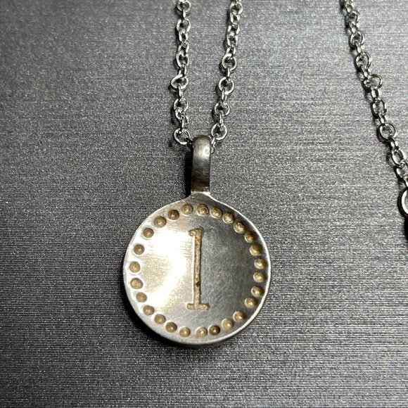 Sterling silver number 1 medallion pendant.
On a complimentary 24” chain - Picture 1 of 4